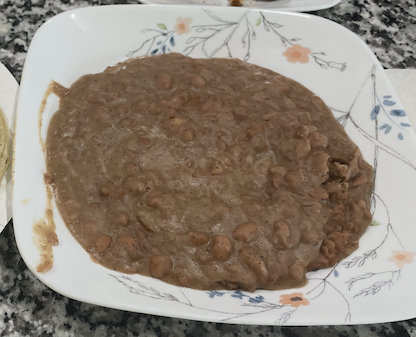 a pan of refried beans